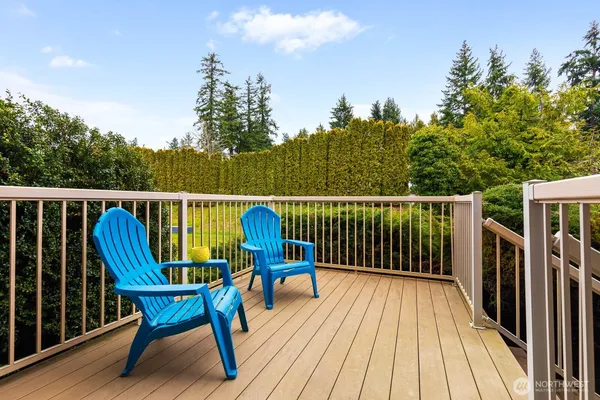 a view of a two chairs on the deck