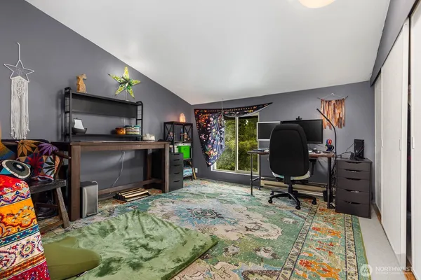 a view of a workspace with furniture
