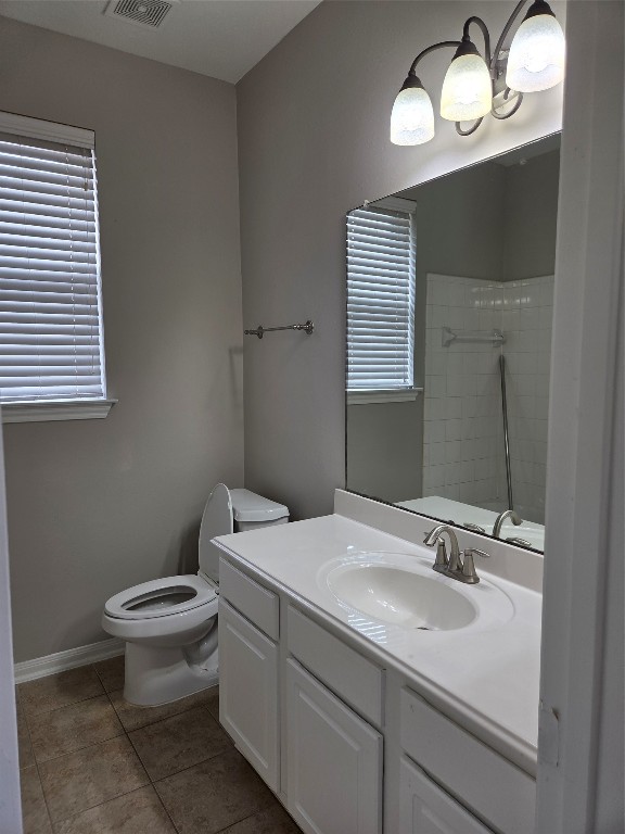 2203 Winchester Lake Rosenberg, TX 77471 - Photo 16 of 20 a bathroom with a toilet sink and mirror