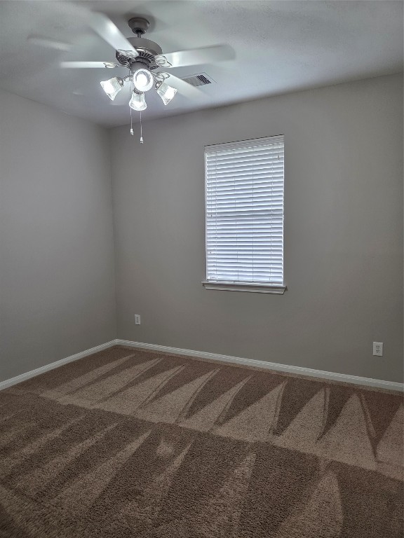 2203 Winchester Lake Rosenberg, TX 77471 - Photo 17 of 20 a view of a room with windows and ceiling fan