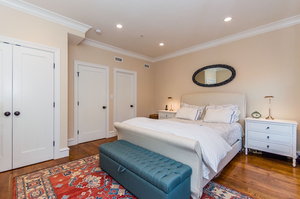 123 Warren Avenue, Unit 2 Boston, MA 02116 - Photo 9 of 13 a bedroom with a bed and a window