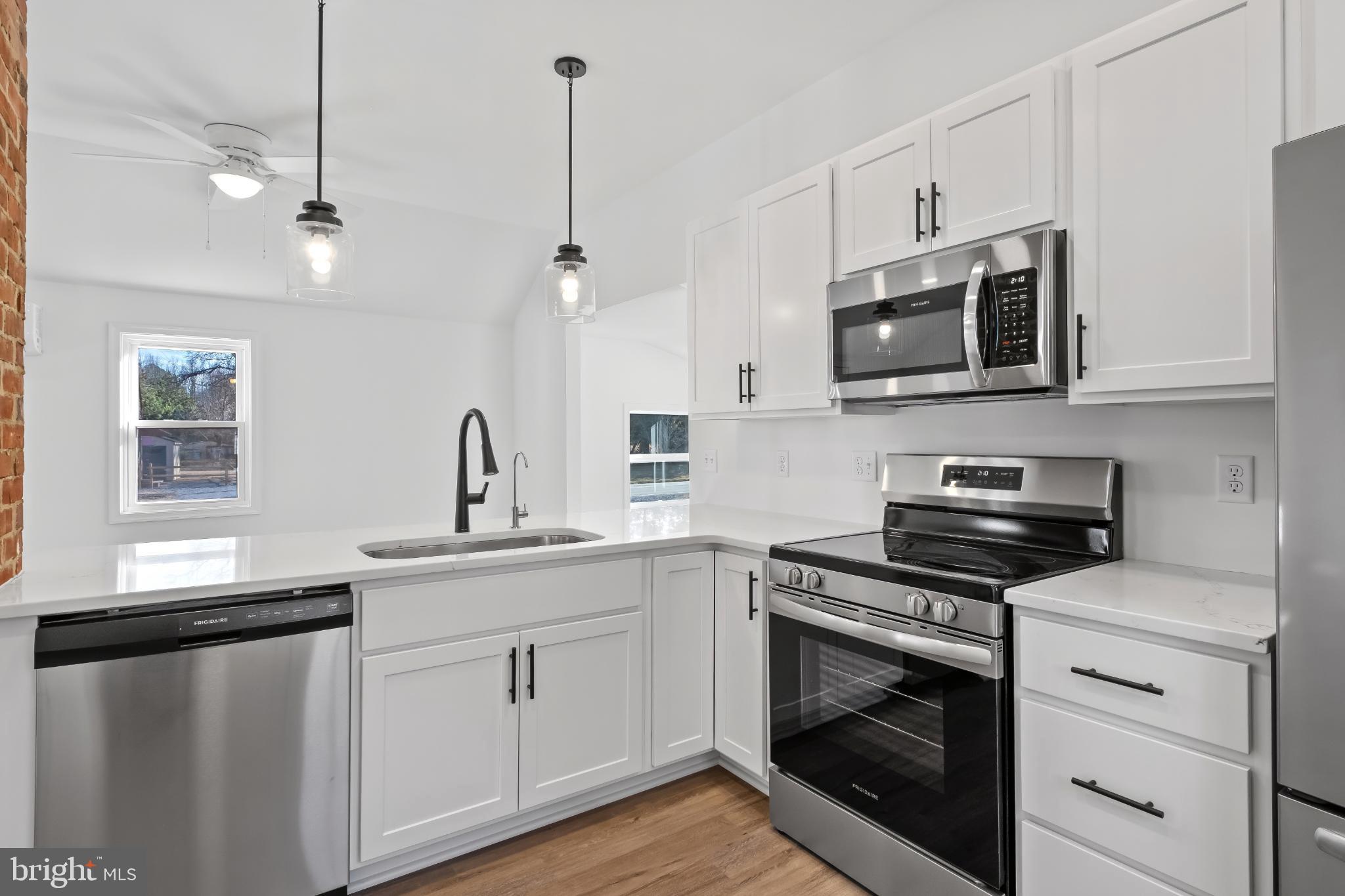 28272 Riverside Drive Salisbury, MD 21801 - Photo 6 of 33 Modern kitchen with sleek finishes.