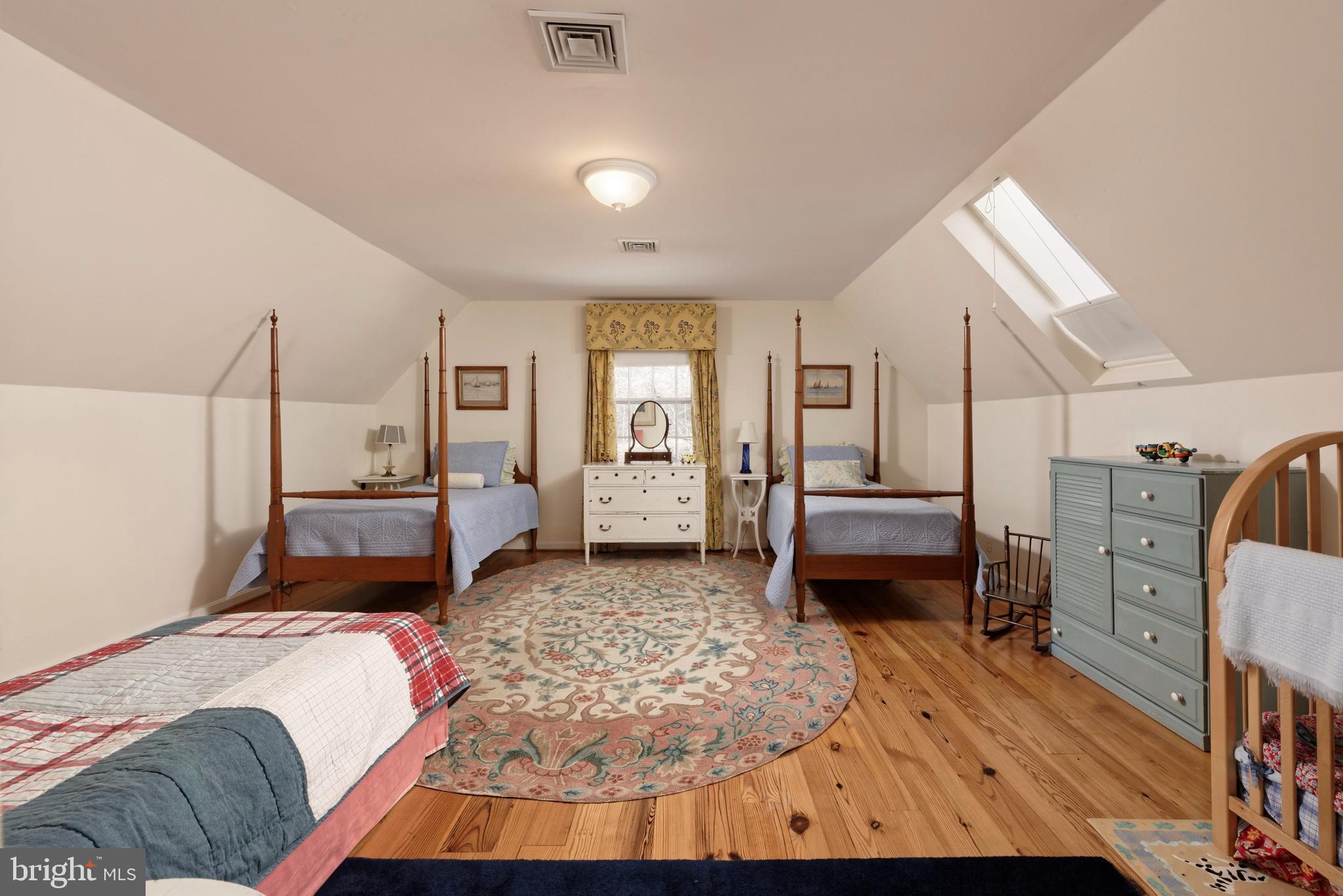 4392 Carrington Road Markham, VA 22643 - Photo 26 of 59 Guest bedroom #3 has hardwood floors & skylight