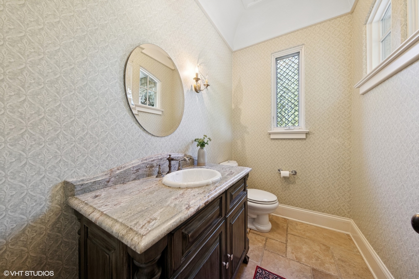 437 North County Line Road Hinsdale, IL 60521 - Photo 14 of 25 a bathroom with a granite countertop sink and a mirror