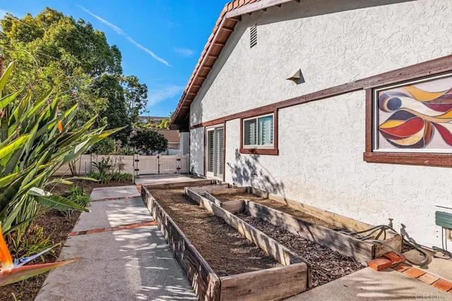 a view of a house with a yard porch and sitting area