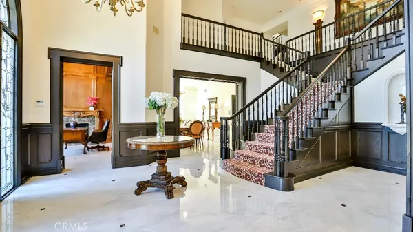 a view of entryway wih livingroom and furniture
