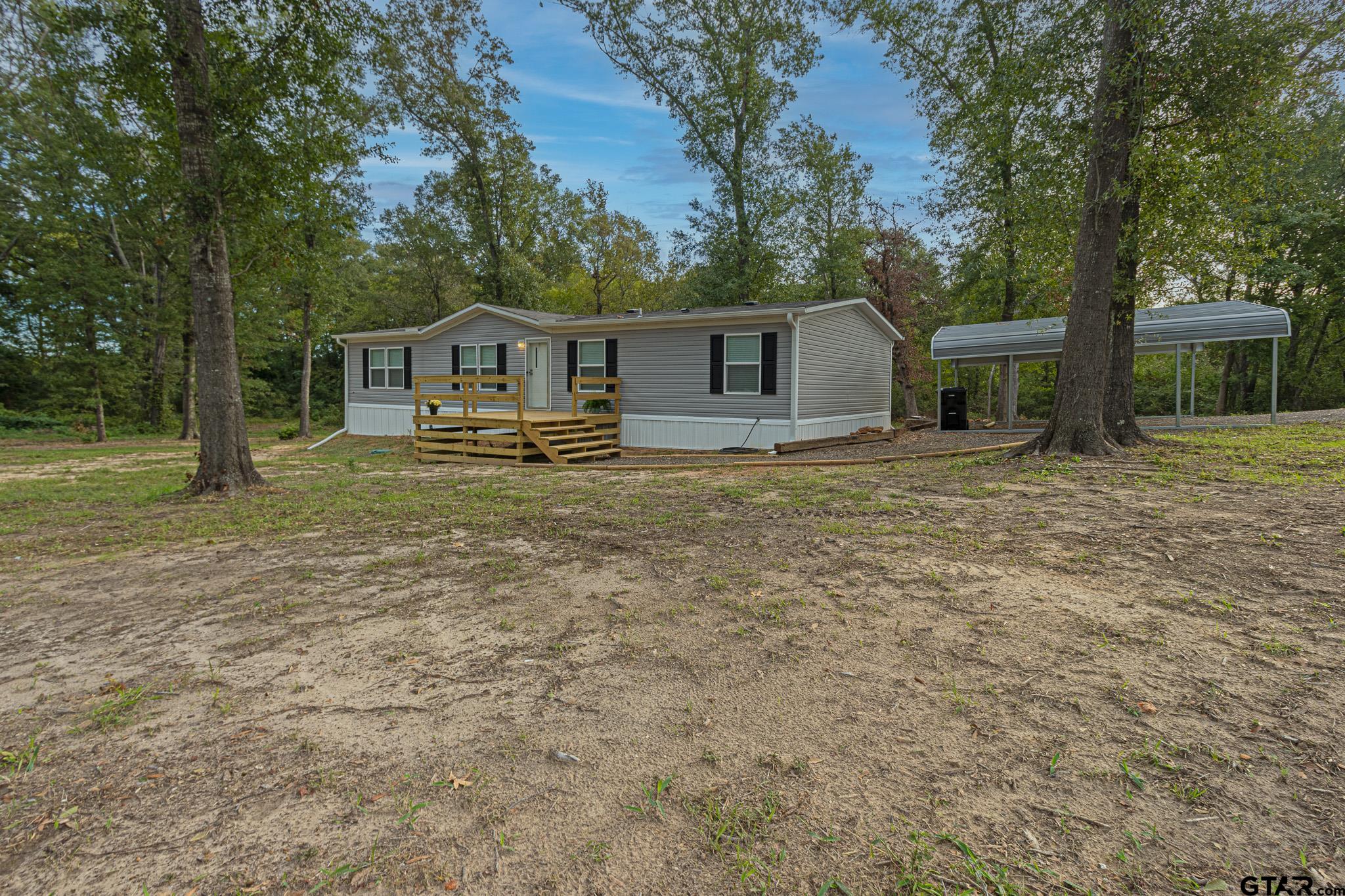 9806 FM 773 Murchison, TX 75778 - Photo 2 of 35 front view of a house with a yard