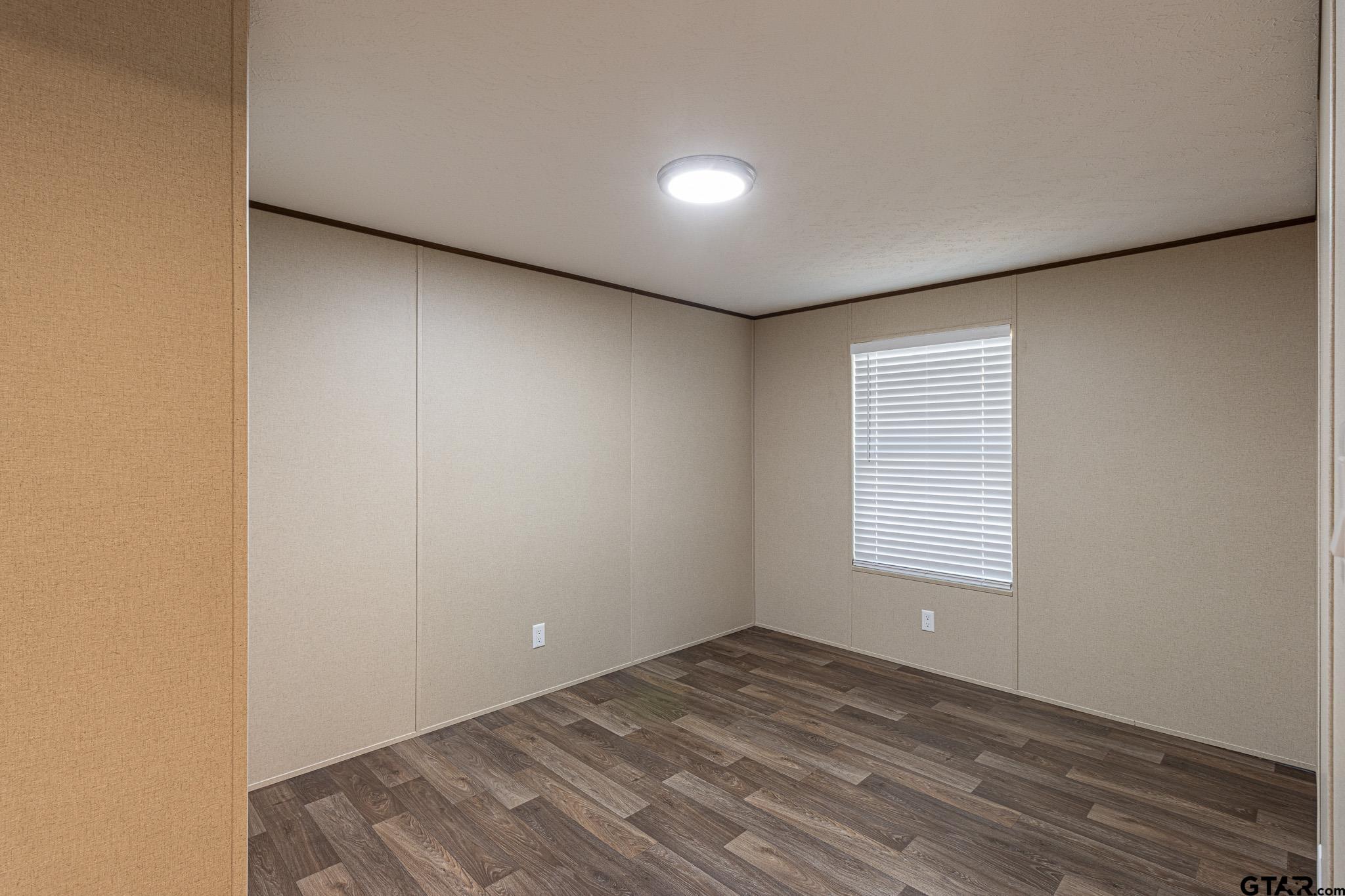 9806 FM 773 Murchison, TX 75778 - Photo 25 of 35 a view of an empty room with a window