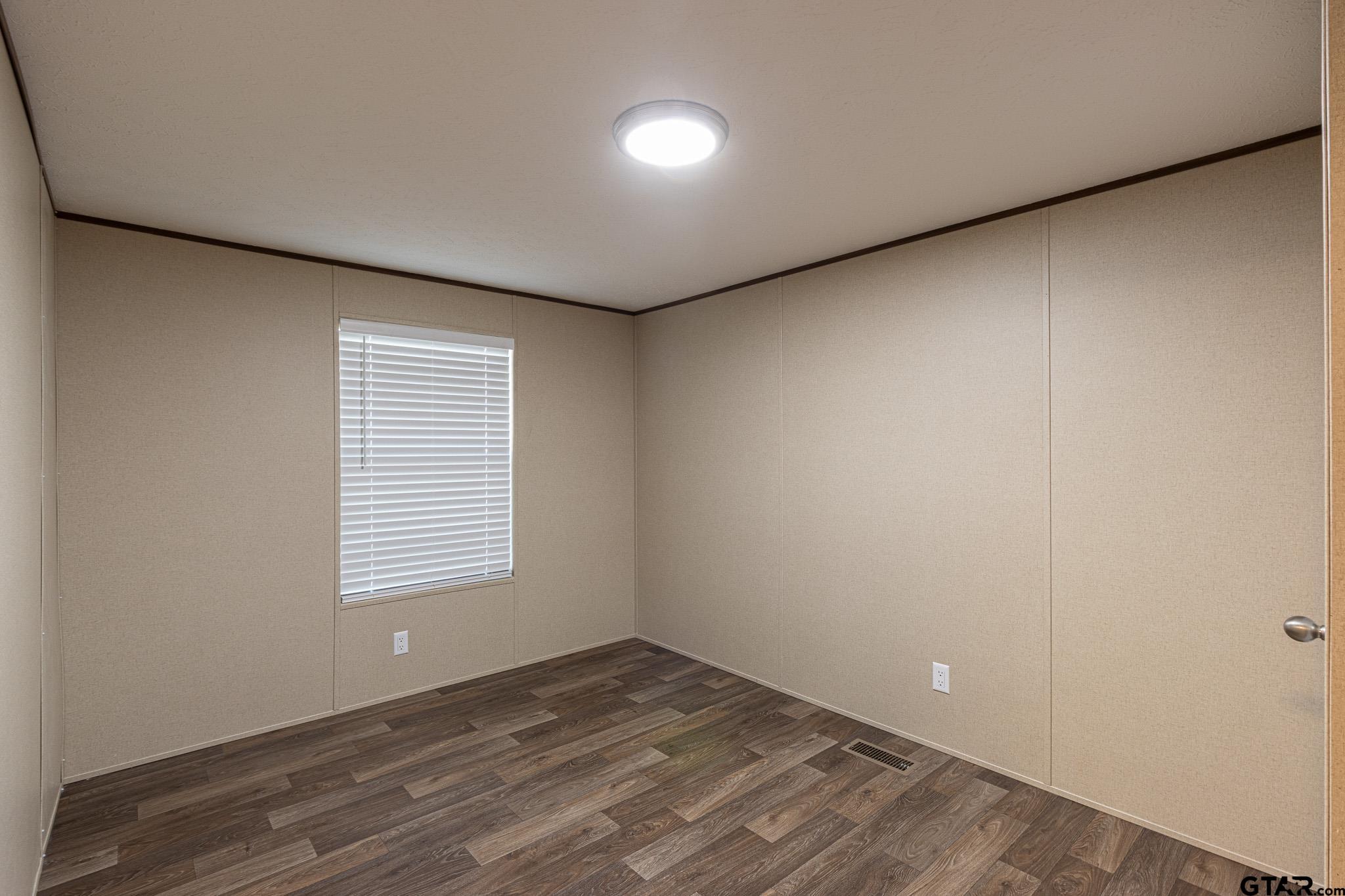 9806 FM 773 Murchison, TX 75778 - Photo 27 of 35 an empty room with a window