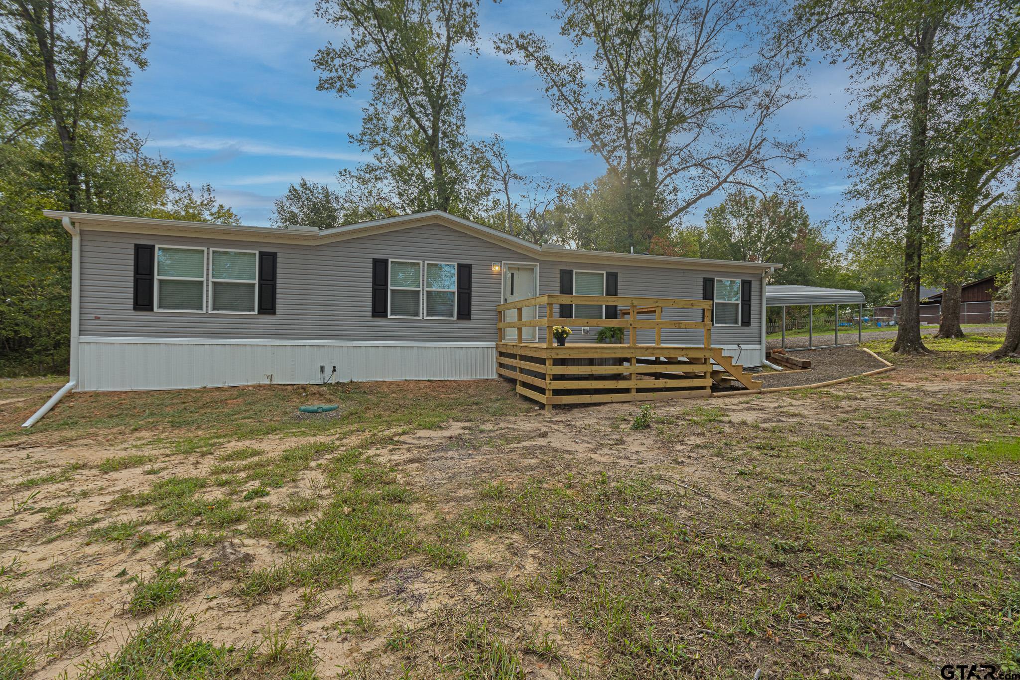 9806 FM 773 Murchison, TX 75778 - Photo 3 of 35 a house with trees in front of it