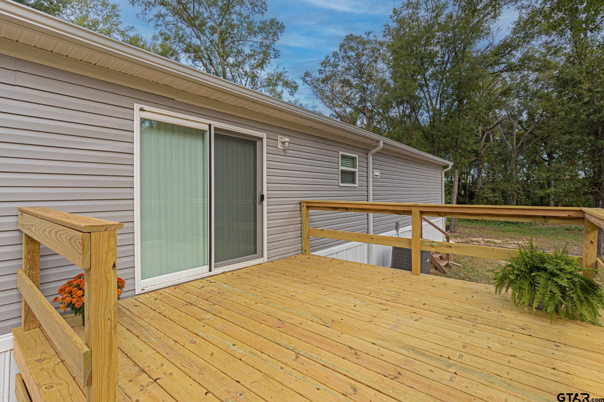 9806 FM 773 Murchison, TX 75778 - Photo 32 of 35 a view of backyard with swimming pool and seating space