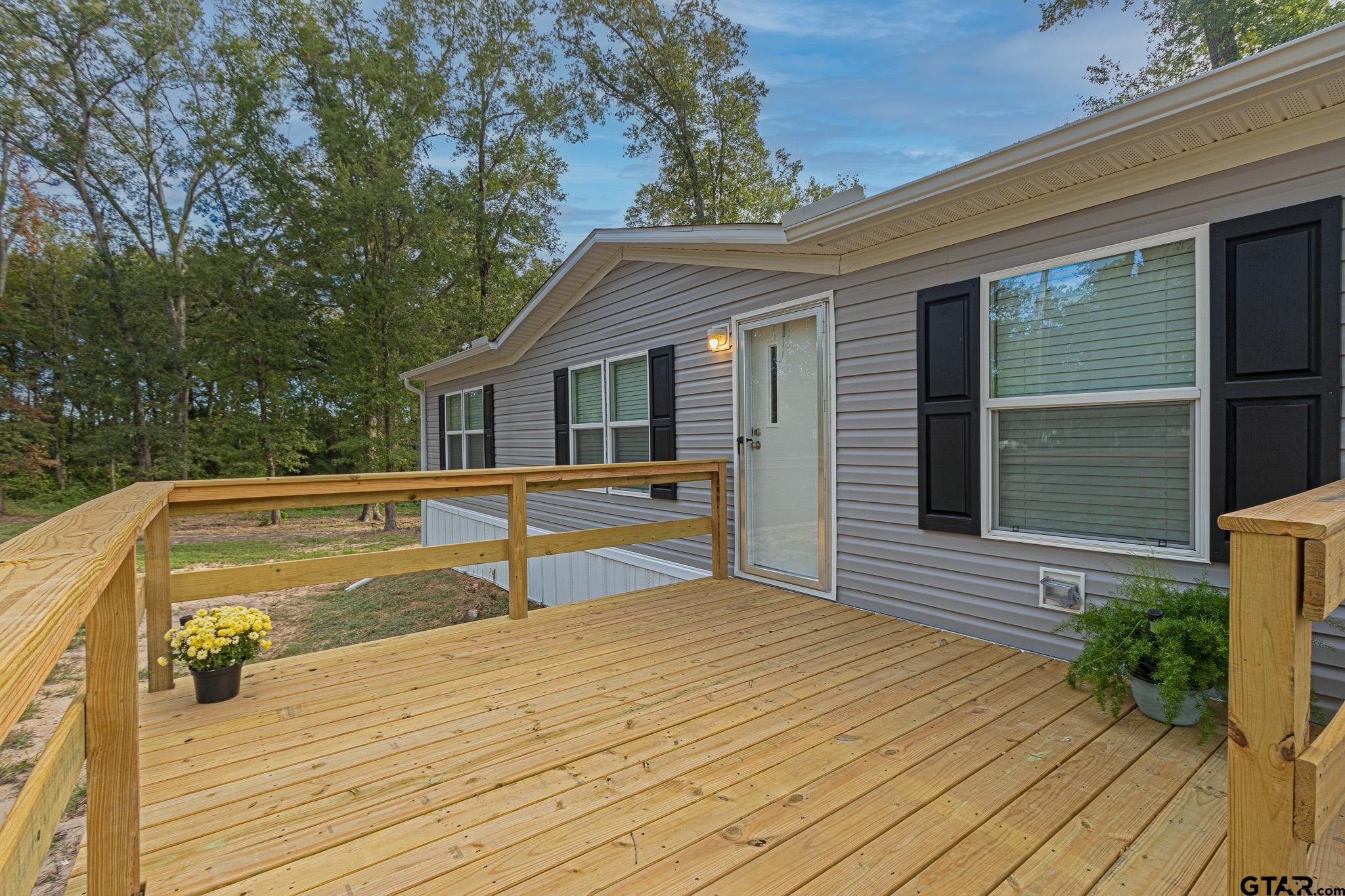9806 FM 773 Murchison, TX 75778 - Photo 33 of 35 a view of a house with pool and wooden floor