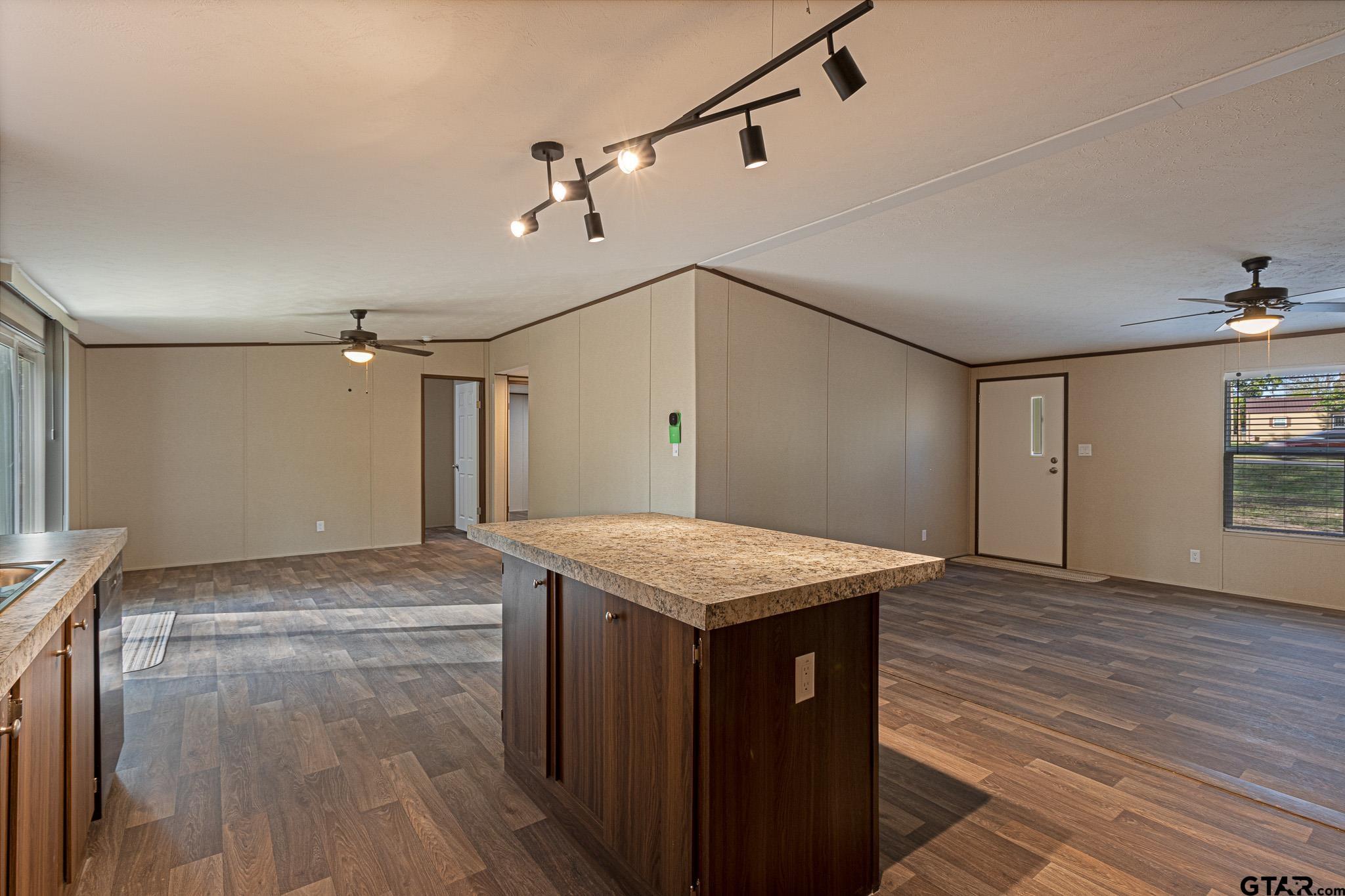 9806 FM 773 Murchison, TX 75778 - Photo 10 of 35 a room with wooden floor and window