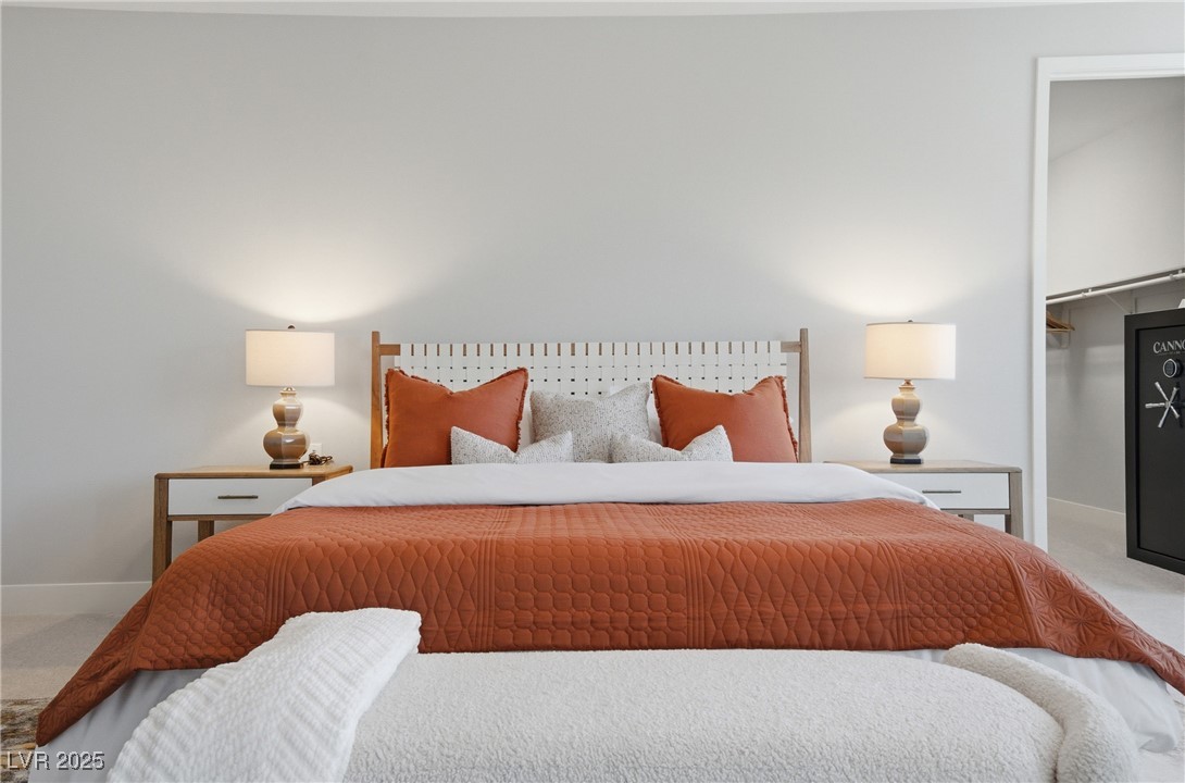 7736 Tioga Ridge Las Vegas, NV 89117 - Photo 22 of 68 Bedroom featuring carpet and a spacious closet