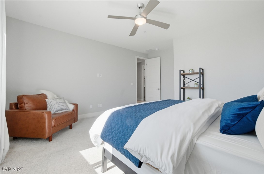 7736 Tioga Ridge Las Vegas, NV 89117 - Photo 36 of 68 Bedroom with carpet and ceiling fan