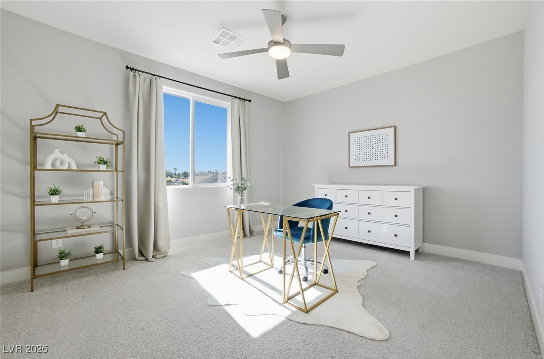 7736 Tioga Ridge Las Vegas, NV 89117 - Photo 41 of 68 Office space with light colored carpet and ceiling fan