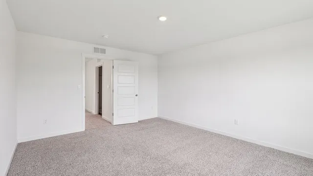 a bathroom with a double vanity sink and mirror