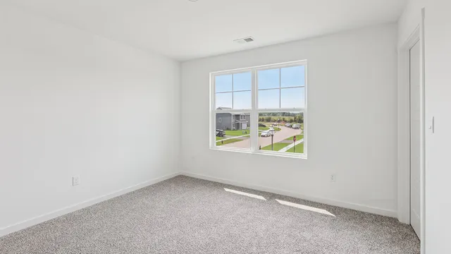 an empty room with windows