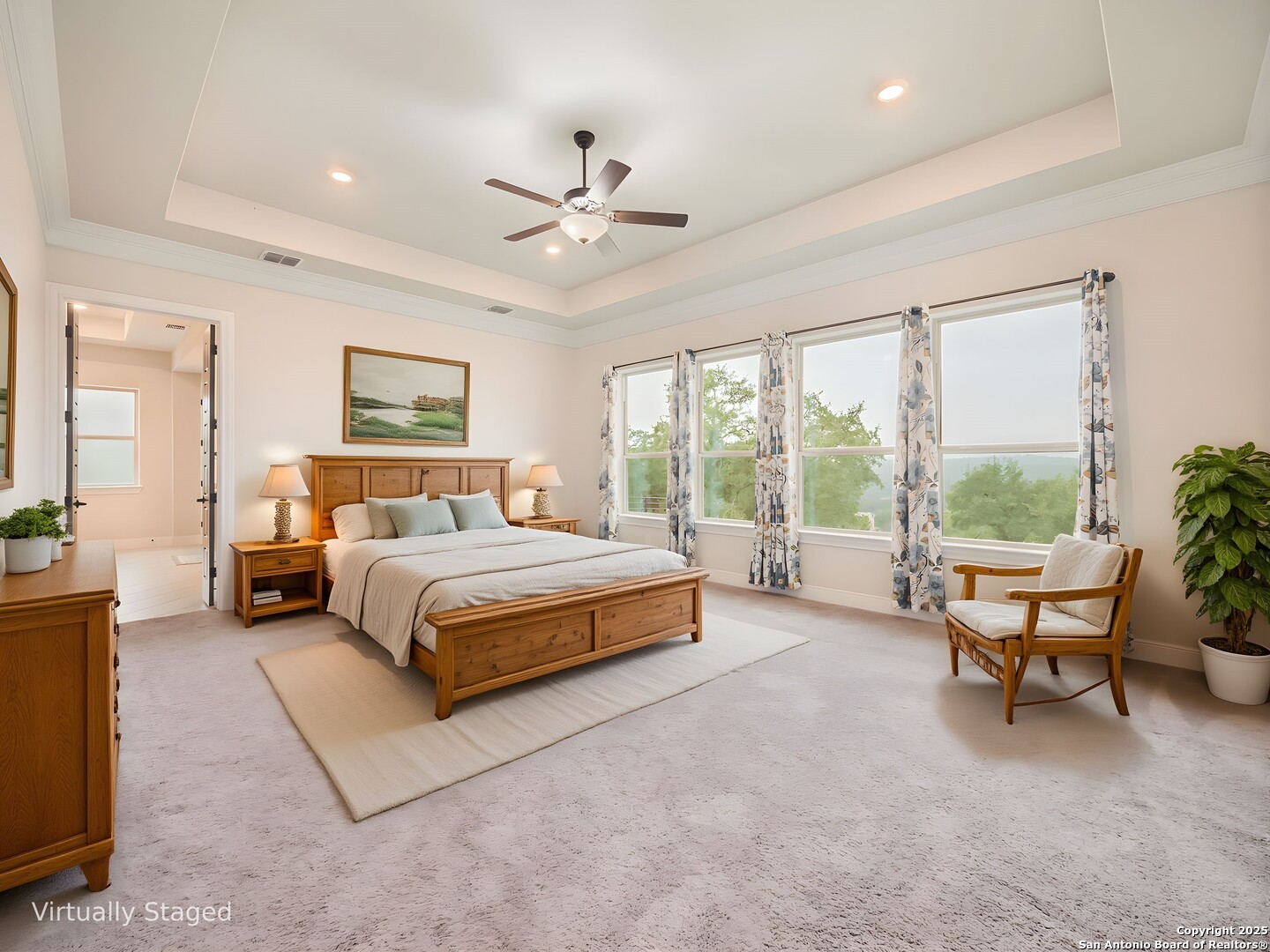 632 Carson Ridge New Braunfels, TX 78132 - Photo 22 of 57 a spacious bedroom with a bed and a couch