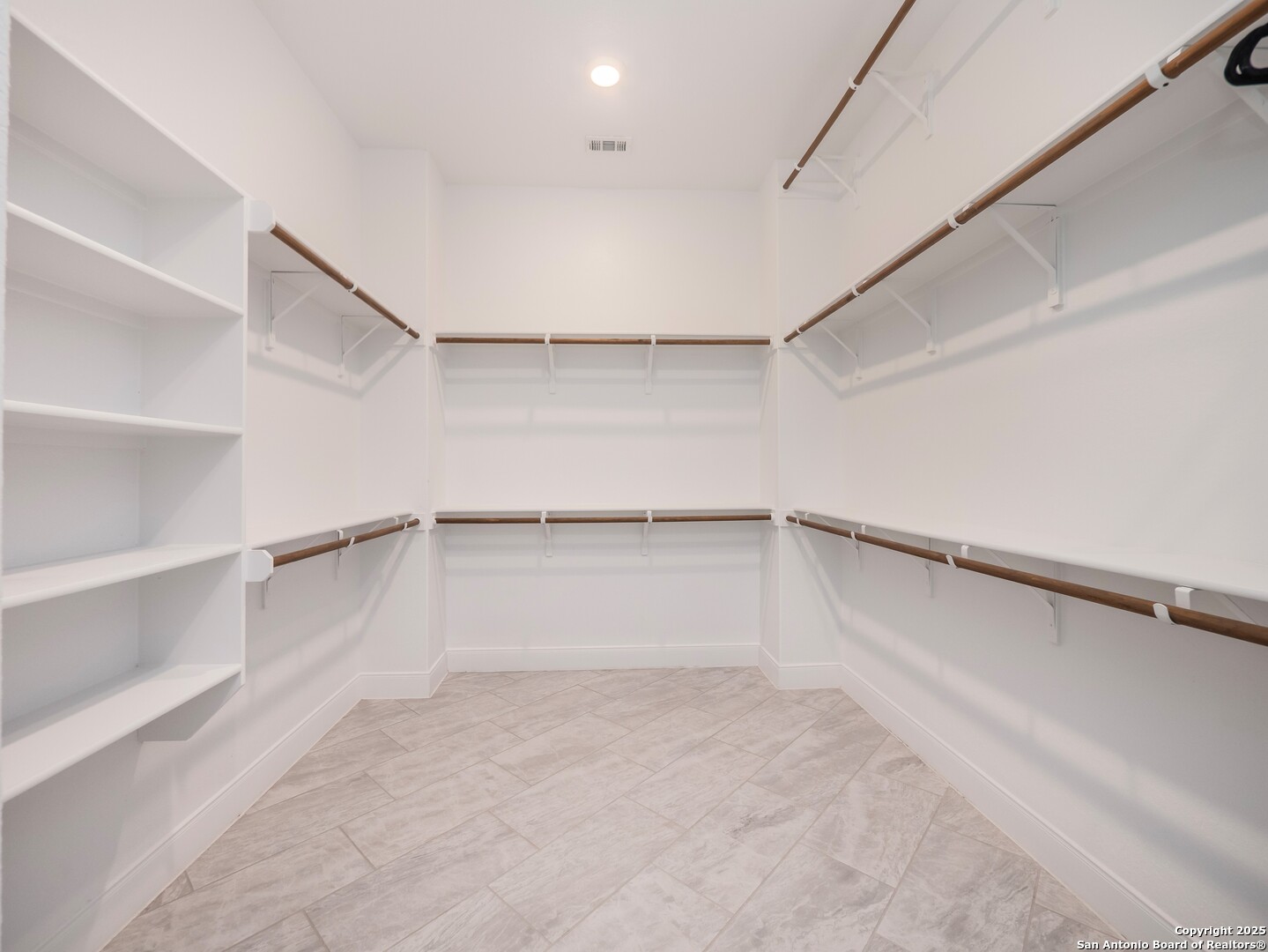 632 Carson Ridge New Braunfels, TX 78132 - Photo 28 of 57 a view of an empty walk in closet