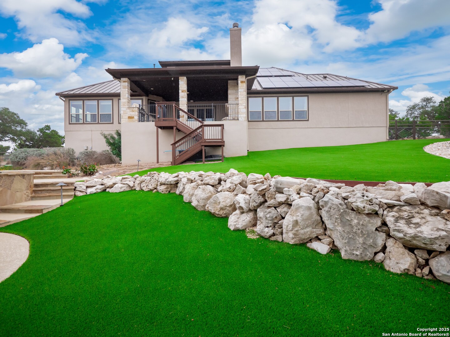 632 Carson Ridge New Braunfels, TX 78132 - Photo 48 of 57 a front view of a house with a garden