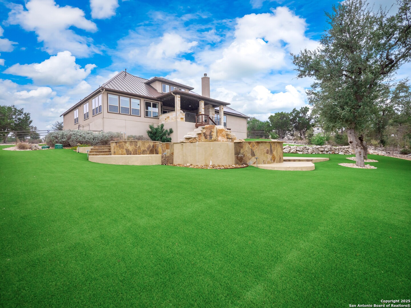 632 Carson Ridge New Braunfels, TX 78132 - Photo 51 of 57 a front view of a house with garden and trees