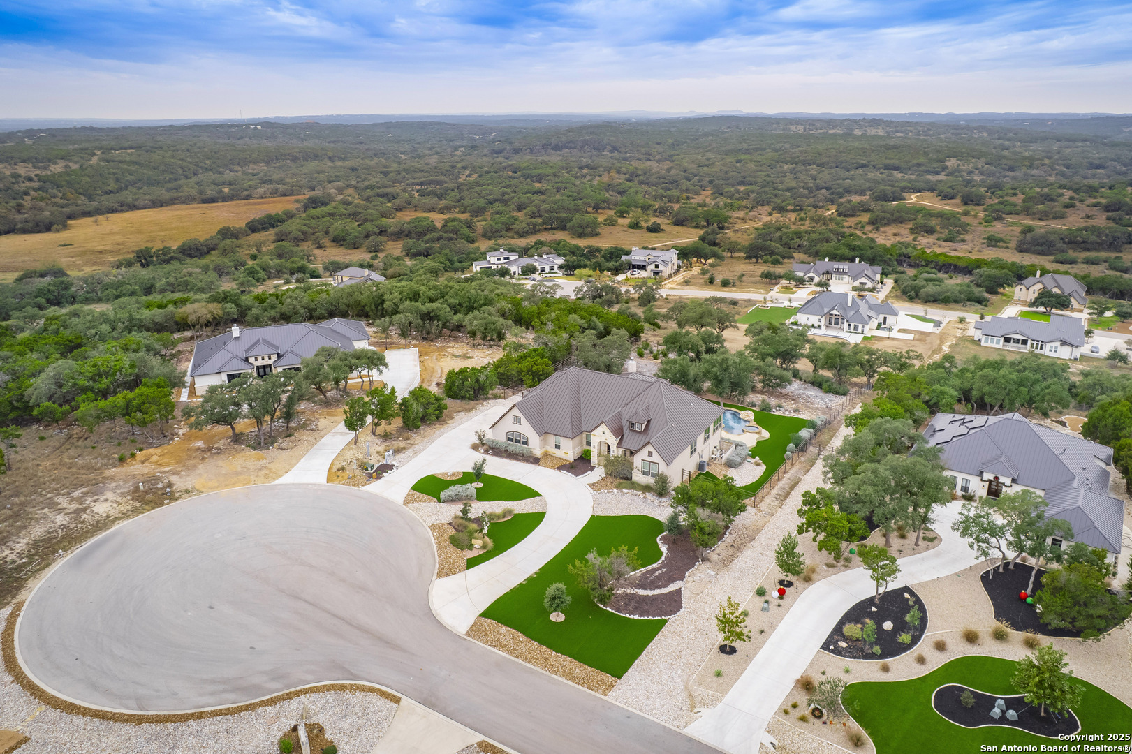 632 Carson Ridge New Braunfels, TX 78132 - Photo 53 of 57 an aerial view of residential houses with outdoor space and ocean view