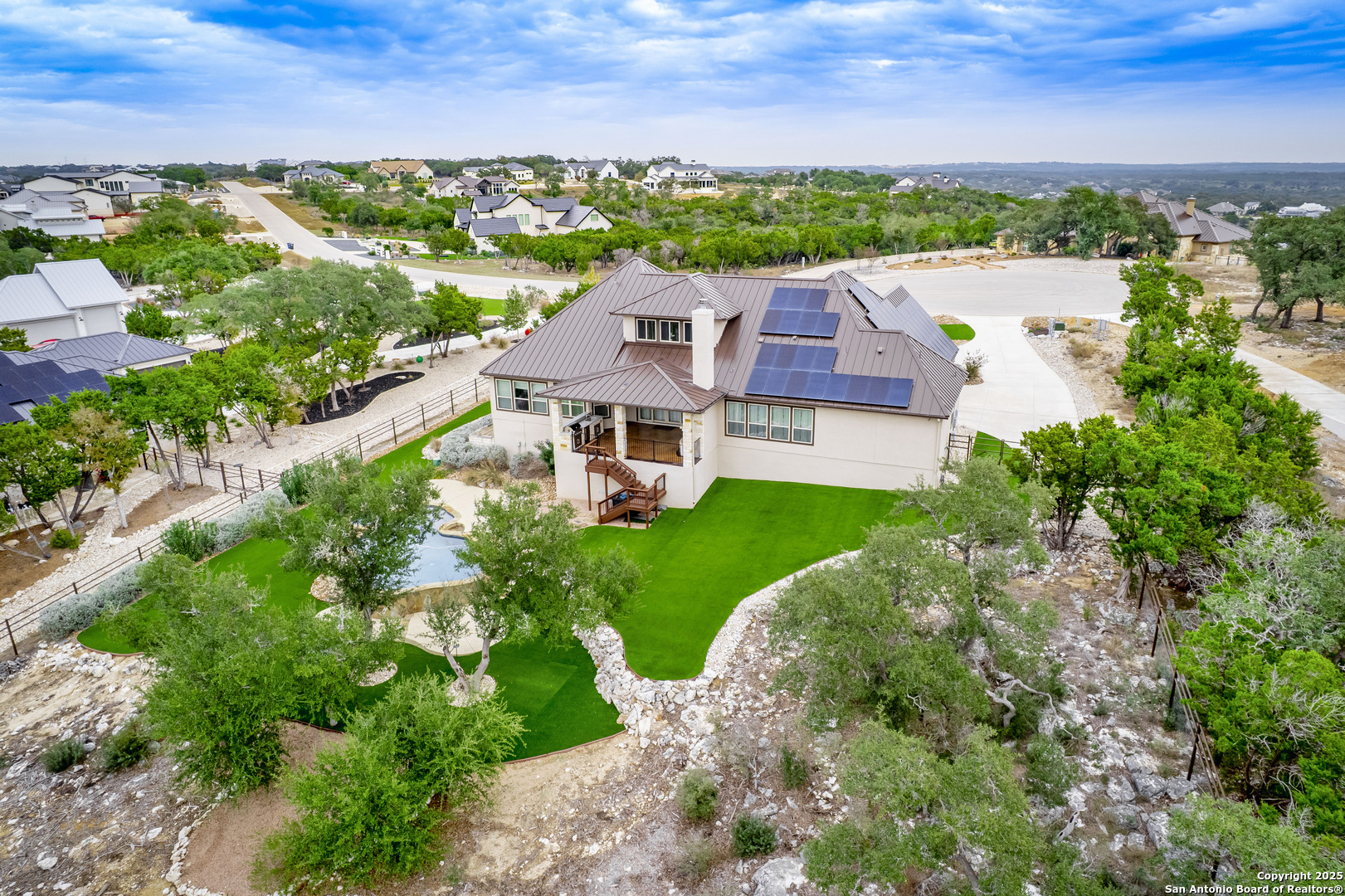 632 Carson Ridge New Braunfels, TX 78132 - Photo 55 of 57 an aerial view of multiple houses with yard