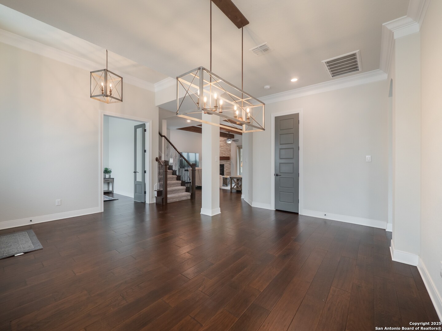 632 Carson Ridge New Braunfels, TX 78132 - Photo 7 of 57 a view of a livingroom with wooden floor and staircase