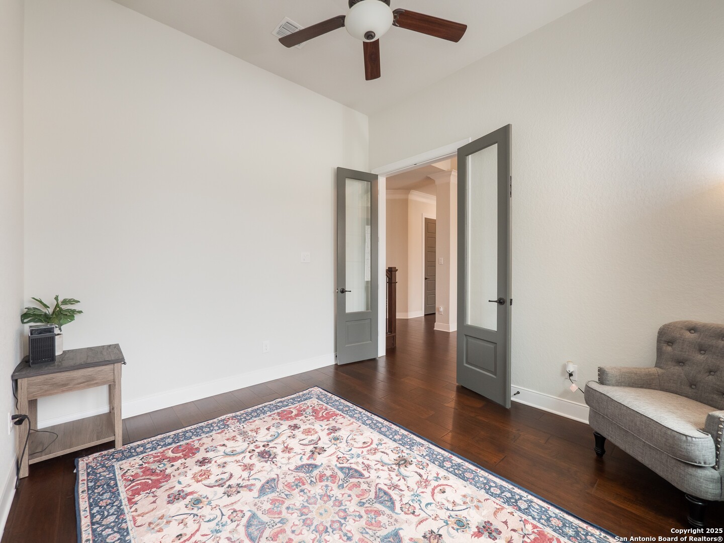632 Carson Ridge New Braunfels, TX 78132 - Photo 9 of 57 a living room with wooden floor and furniture