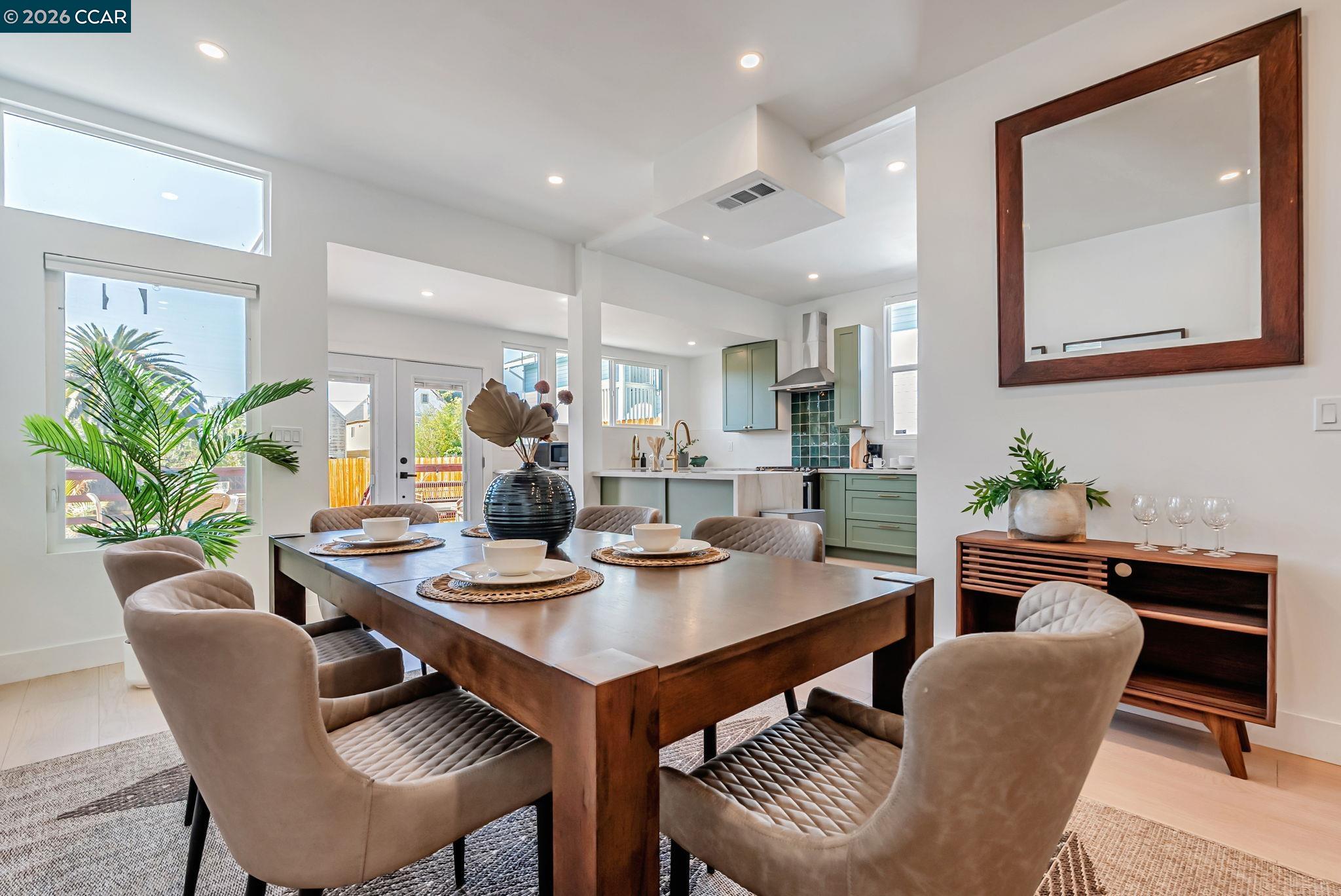 1727 9th Street Oakland, CA 94607 - Photo 14 of 36 a dining room with furniture and window