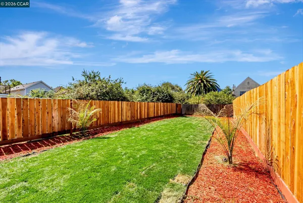 a view of a backyard with a garden