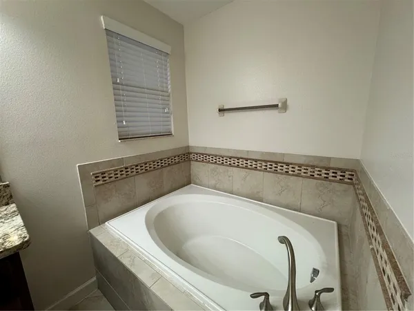 a bathroom with a bathtub