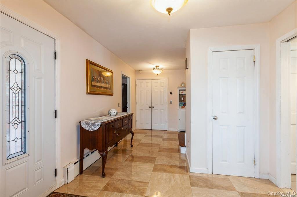 77 Duck Pond Road Glen Cove, NY 11542 - Photo 13 of 35 a view of a hallway with seating area
