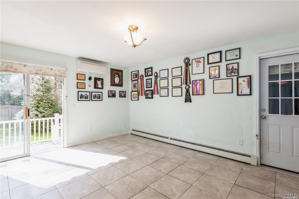 77 Duck Pond Road Glen Cove, NY 11542 - Photo 23 of 35 a view of a livingroom with a window
