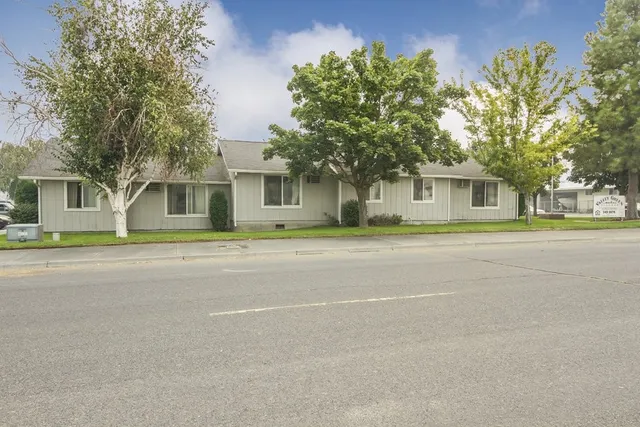 front view of a house with a street