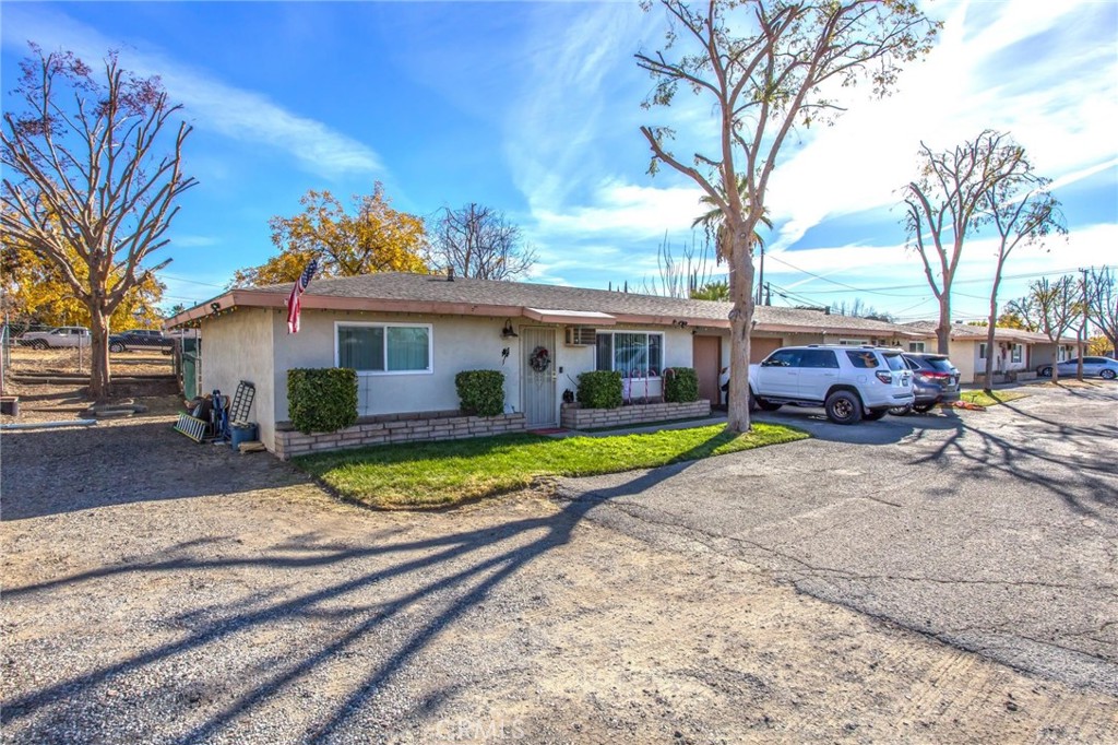 32390 Ave D Yucaipa, CA 92399 - Photo 14 of 44 a view of house with outdoor space and swimming pool