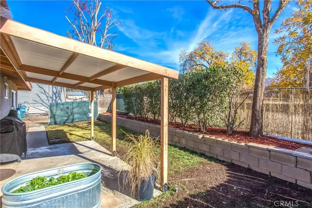 a view of yard with outdoor seating