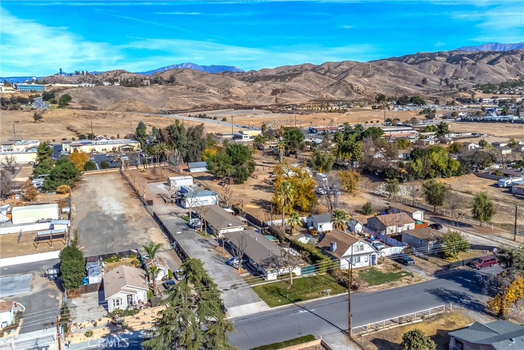 32390 Ave D Yucaipa, CA 92399 - Photo 25 of 44 an aerial view of residential building and lake view