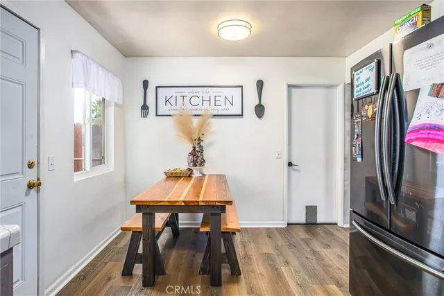 a kitchen with a sink a stove and cabinets