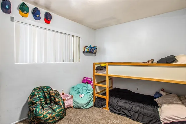 a room with a table and windows