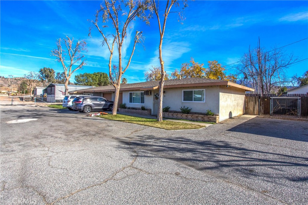 32390 Ave D Yucaipa, CA 92399 - Photo 9 of 44 a view of house with outdoor space and swimming pool