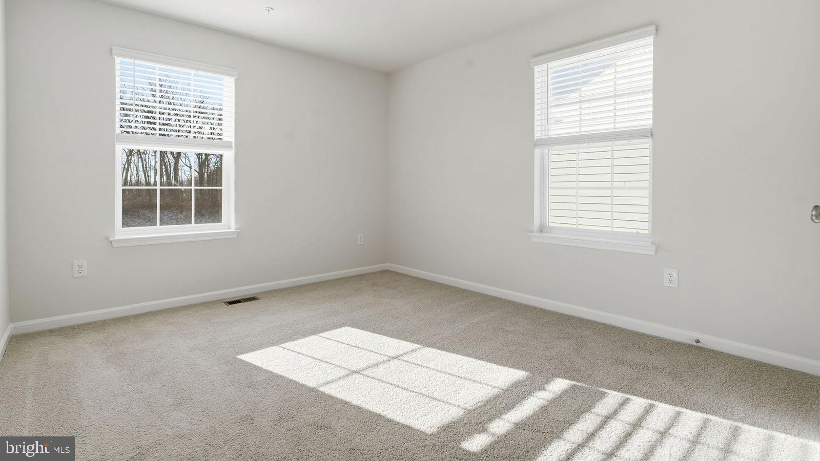 8110 Cypress Pt Drive Rosedale, MD 21237 - Photo 23 of 37 an empty room with a window
