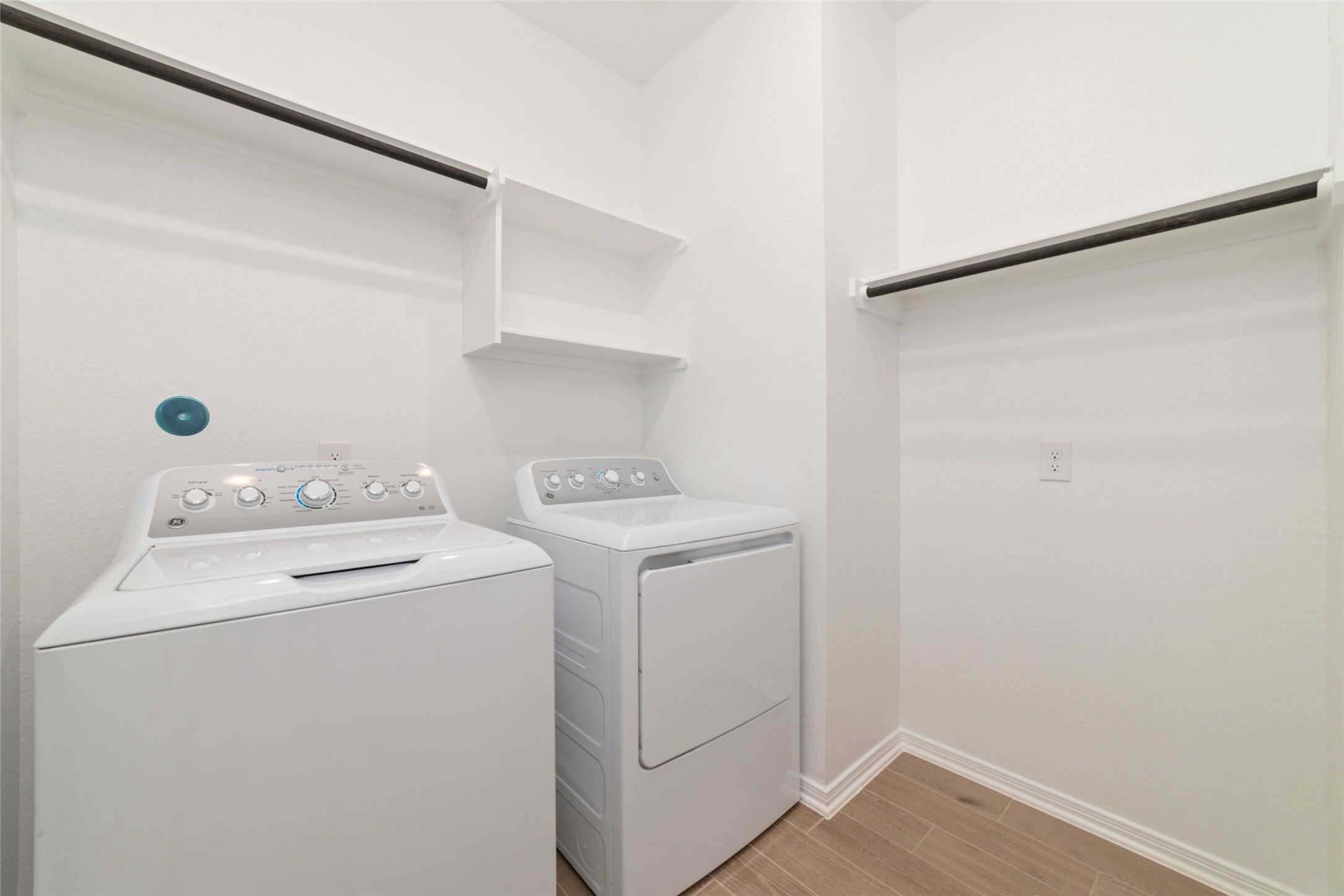 135 East Coralburst Loop, Unit 1 Montgomery, TX 77316 - Photo 19 of 22 a utility room with dryer and washer