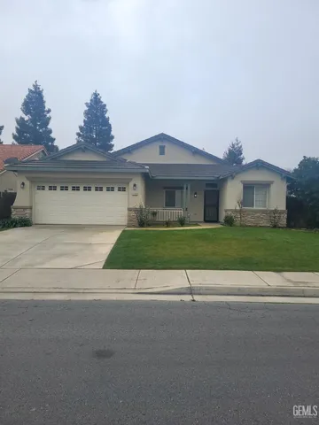 front view of house with a yard