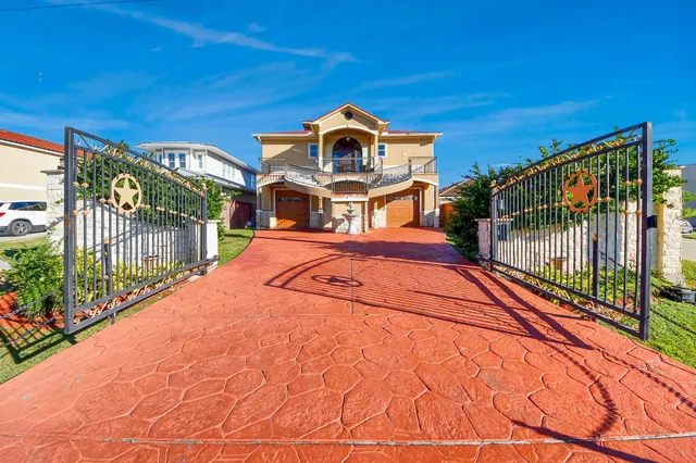 a front view of a house with a swimming pool