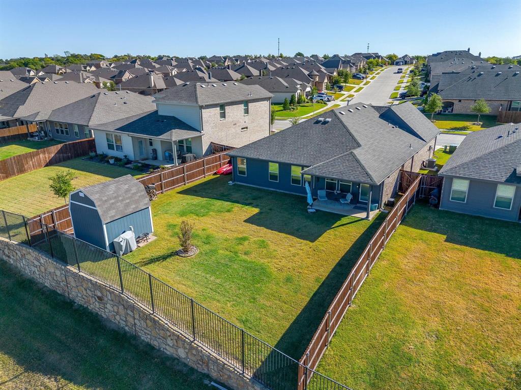 748 Ruellia Street Weatherford, TX 76086 - Photo 34 of 37 an aerial view of a house with swimming pool