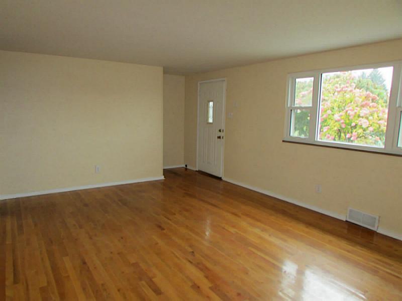 204 Ewing Road McKees Rocks, PA 15136 - Photo 2 of 14 Living Room. Gleaming Hardwoods