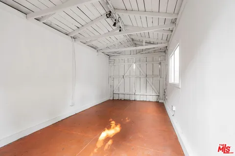 a view of a room with racks on the wall