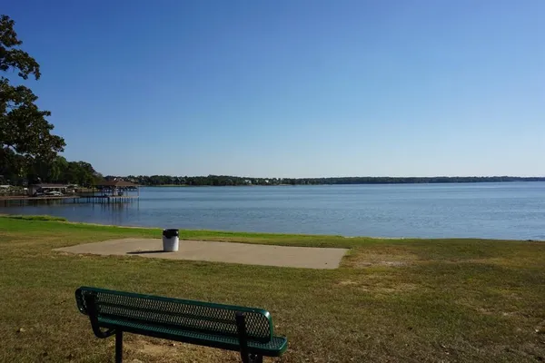a view of a lake and outdoor space